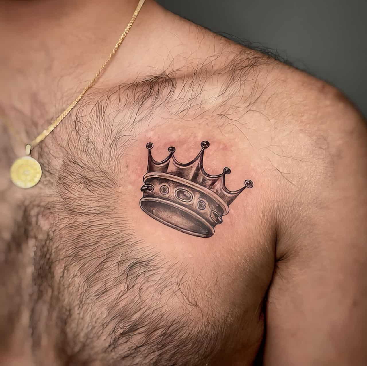 Red little crown tattoo by Loz Thomas inked on the left arm | Crown tattoo, Crown  tattoo design, Simple crown tattoo