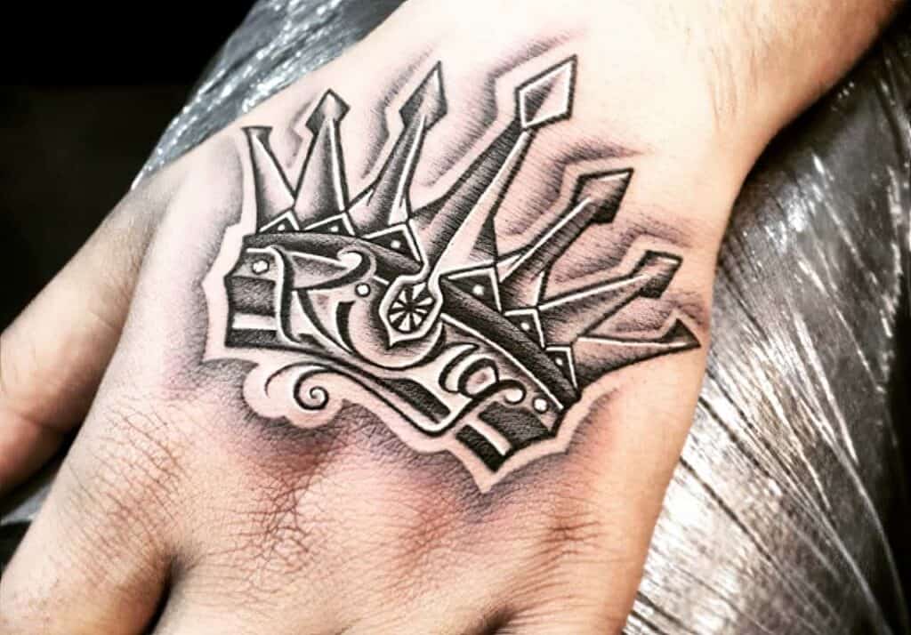 The Ultimate Guide to Crown Tattoos for Men: Design Ideas, Symbolism, and Inspiration in 2023 24 mens crown tattoo 16