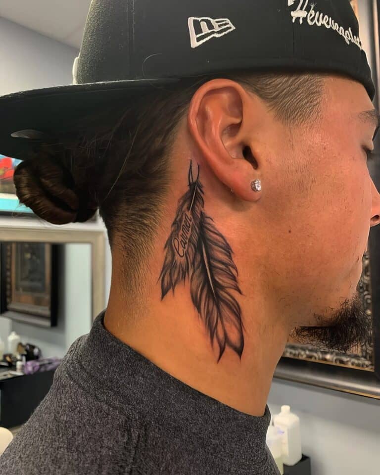 The Top 22 Feather Tattoo Designs For Men