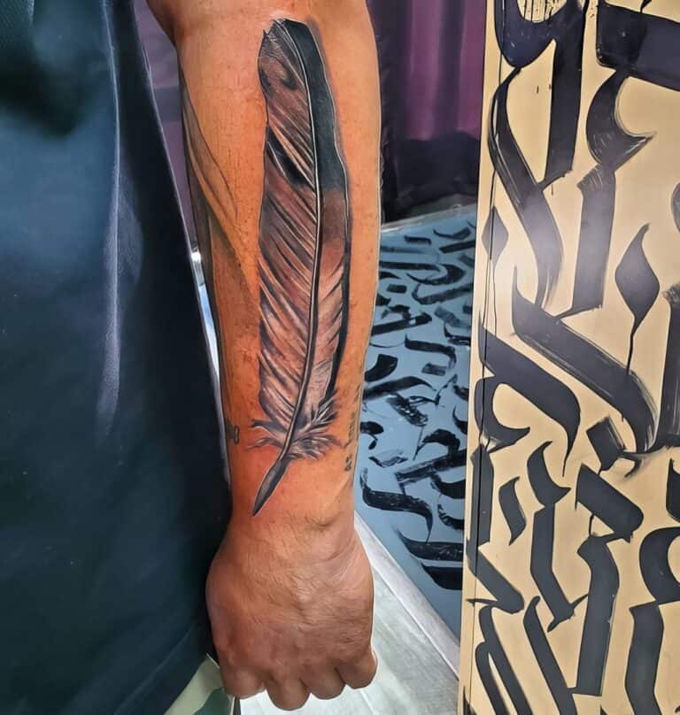 The Top 22 Feather Tattoo Designs For Men