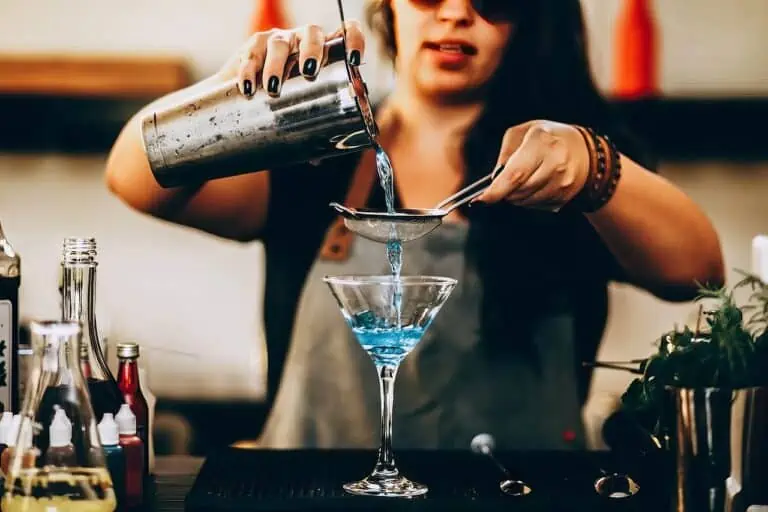 bartending pouring a cocktail