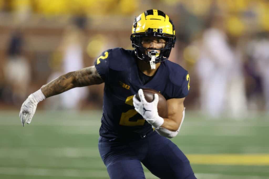 Ink and Impact: Tattoos as Reflections of Personality and Values of Michigan Wolverines Players 2 Cole Cabana
