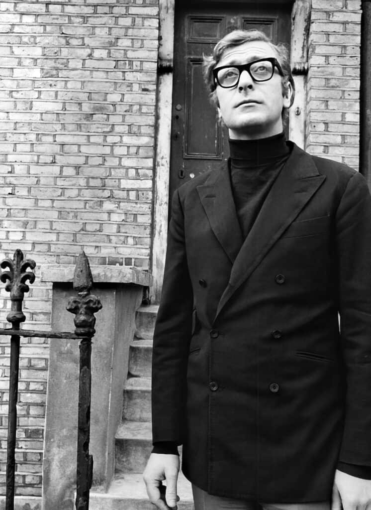 The Ultimate Guide to Timeless Men's Style: How to Achieve Effortless and Classic Fashion Looks 15 Michael Caine wearing sweater