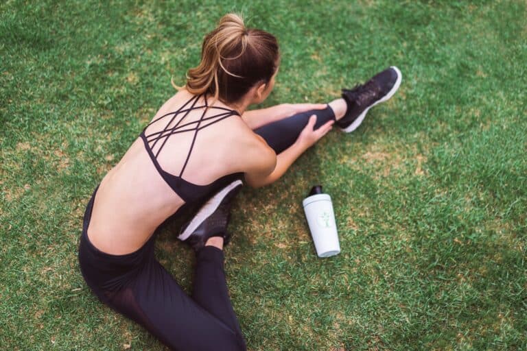 Hot girl stretching after injury