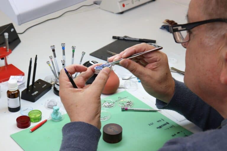 Watchmaker working on Tufina Watch