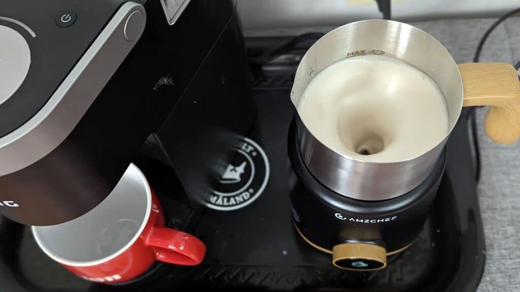 AMZCHEF Milk Frother Review: Worth the Whirl or Just Foam? 3 AMZCHEF Milk Frother spinning milk