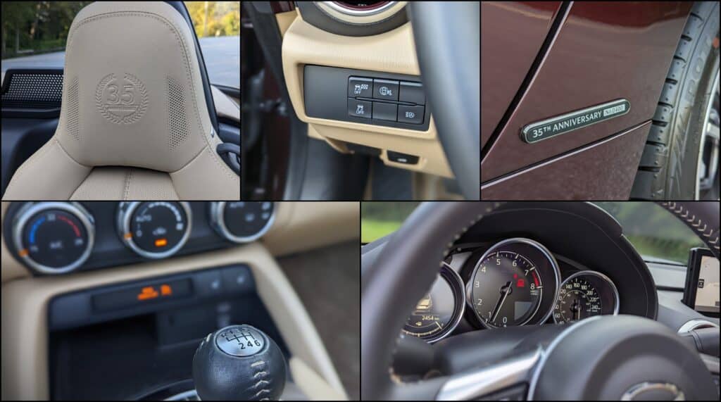 Gray leather car seat embroidered with 35th anniversary logo with seats in a modern vehicle interior.