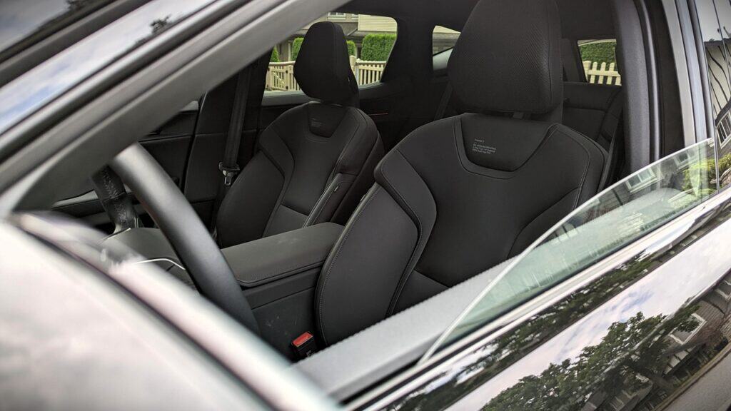 2025 Polestar 3 Long Range Dual Motor Review 10 Black leather car seats with sleek design and headrests inside a modern vehicle on Unfinished Man.