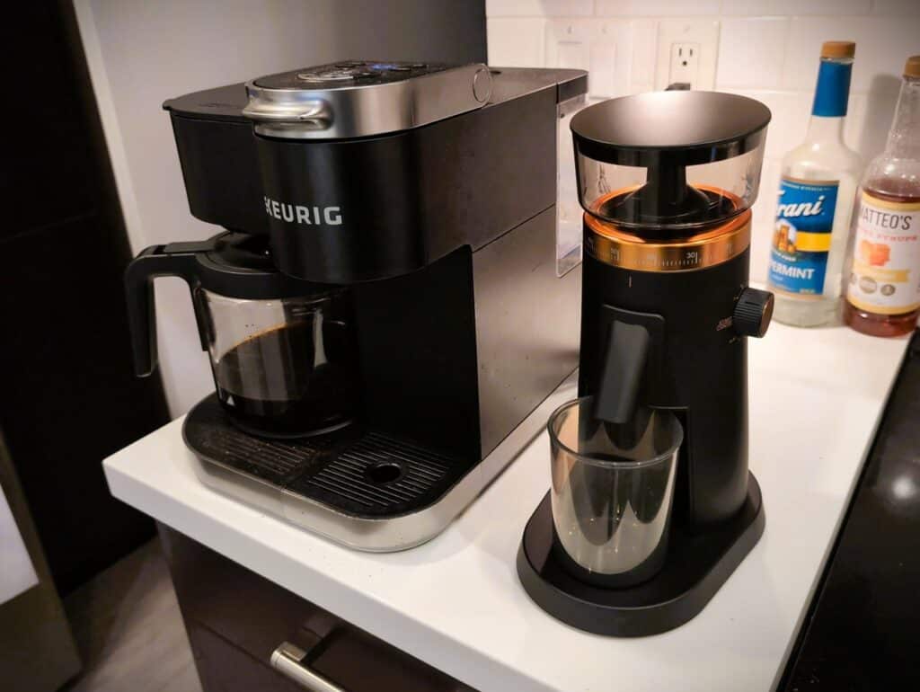 Brew coffee machine with a coffee grinder on a kitchen countertop, modern kitchen appliance setup, perfect for coffee lovers and home brewing enthusiasts.