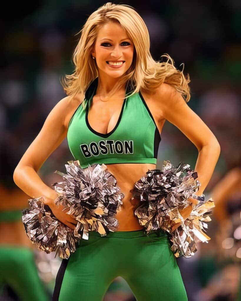 Vibrant cheerleader in green sports attire holding silver pom-poms at a sporting event, showcasing enthusiasm and team spirit, with a blurred crowd background.