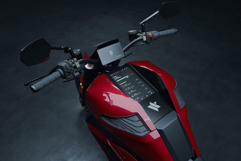Verge TS Pro 2025 by Verge Motorcycles: 7 Next-Level Upgrades 6 Electric motorcycle dashboard displaying real-time battery and performance data, sleek red design, advanced digital screen with analytics, modern electric motorcycle for eco-friendly commuting, high-tech vehicle features.
