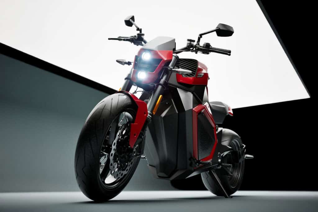 Verge TS Pro 2025 by Verge Motorcycles: 7 Next-Level Upgrades 7 Futuristic red and black electric motorcycle with sleek design and LED lights, innovative gear for modern riders.