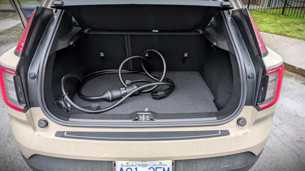 2026 Volvo EX30 Twin Motor Performance Ultra Review 13 Efficient electric vehicle trunk space with charging cable inside, showcasing the compact design of the 2026 Volvo EX30 Twin Motor. Perfect for urban driving and everyday use.