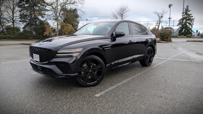 Elegant black 2026 Genesis GV80 SUV parked outdoors, showcasing its sleek design and modern features.
