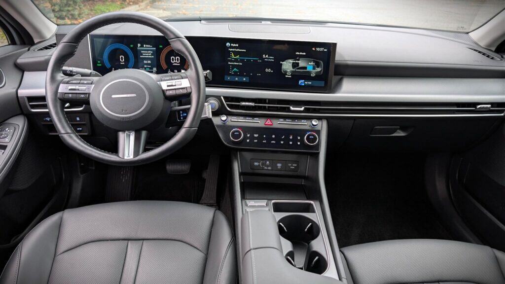 Interior view of the 2026 Hyundai Sonata Hybrid dashboard and steering wheel.