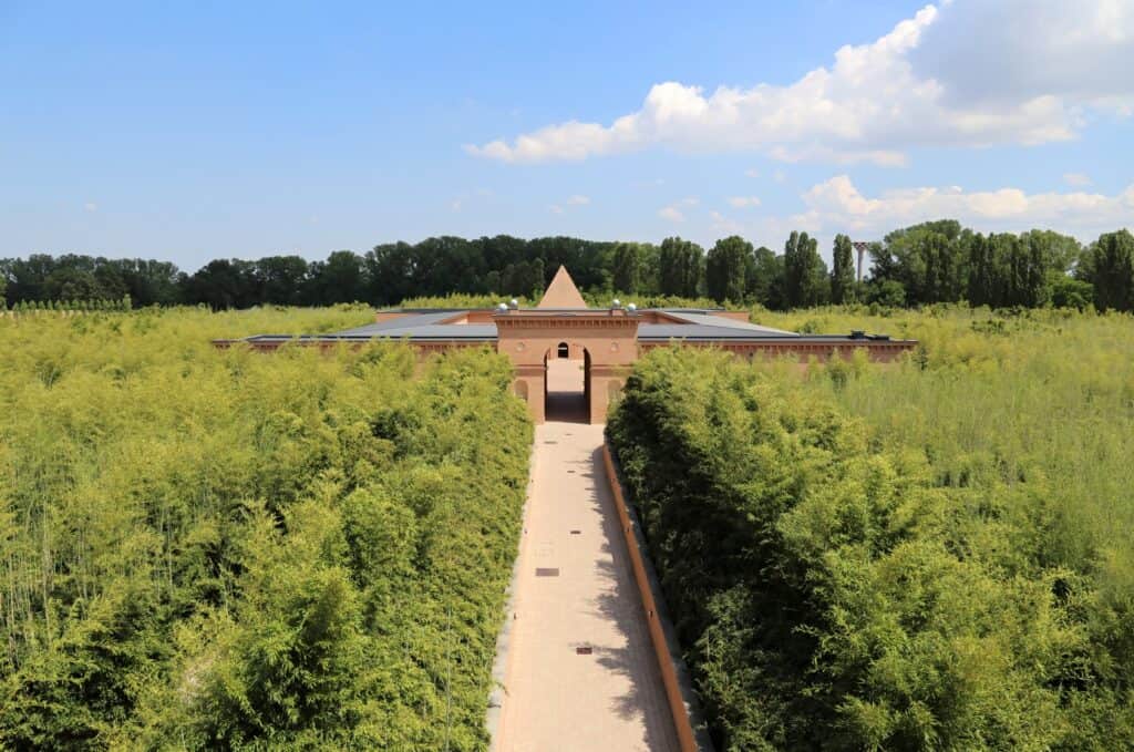 Ancient Italian garden with lush greenery and classical architecture.