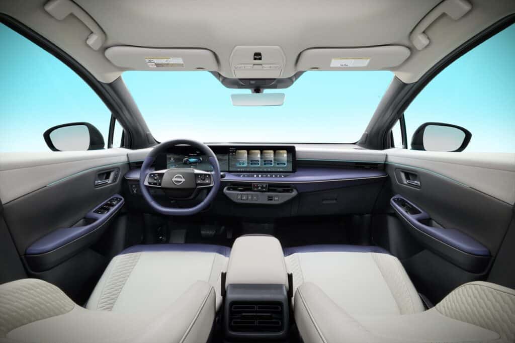 Interior view of the 2026 Nissan Leaf SV+ showcasing modern dashboard and advanced infotainment system.