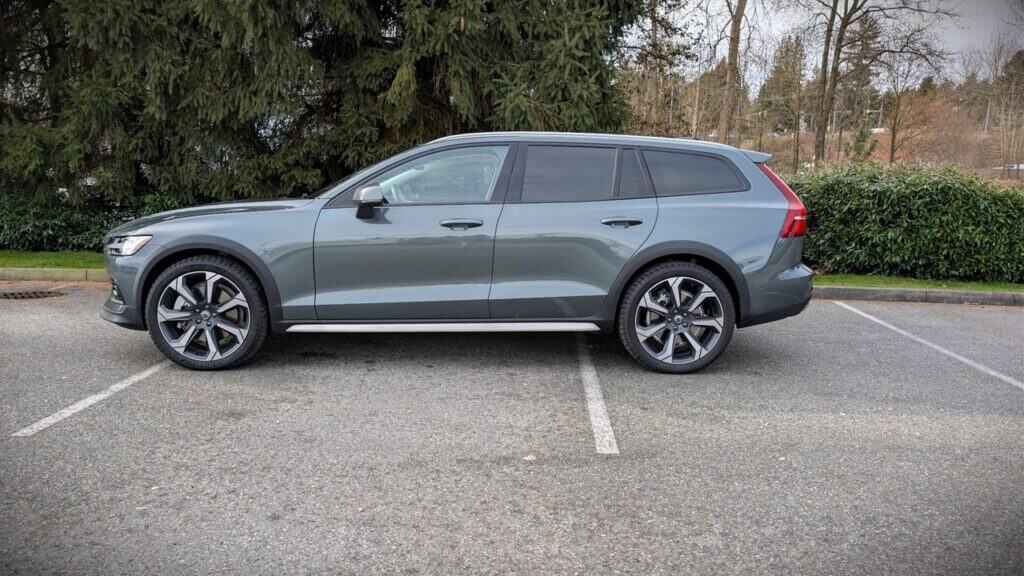 Luxury SUV parked outdoors with trees in the background.