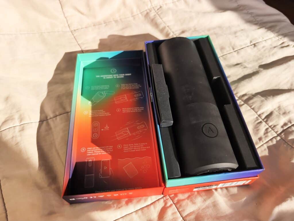 Unfinished Man review of Arcwave Orbit: sleek black rotating stroker device in its colorful packaging.