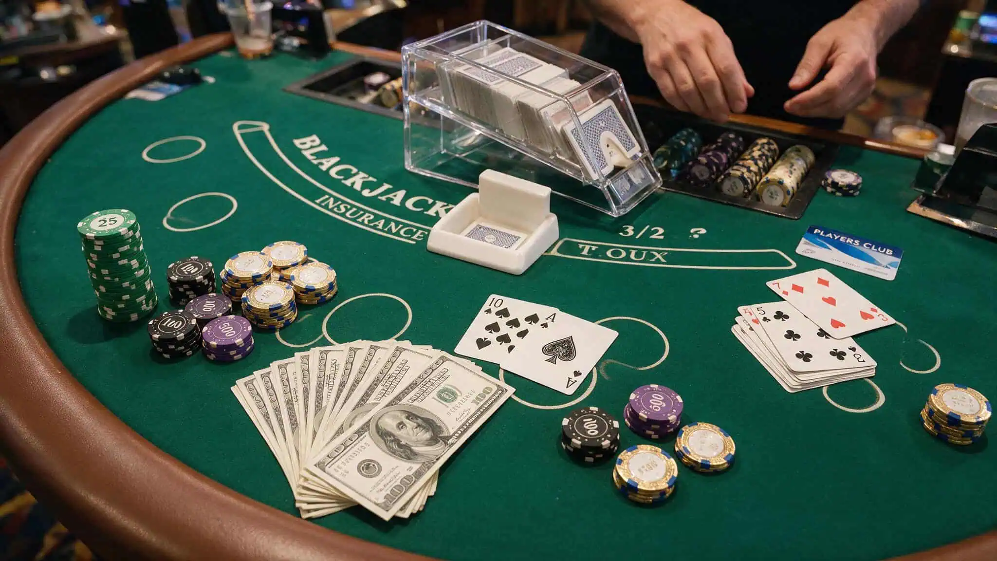 Blackjack table with player's card and chips for theoretical loss comps