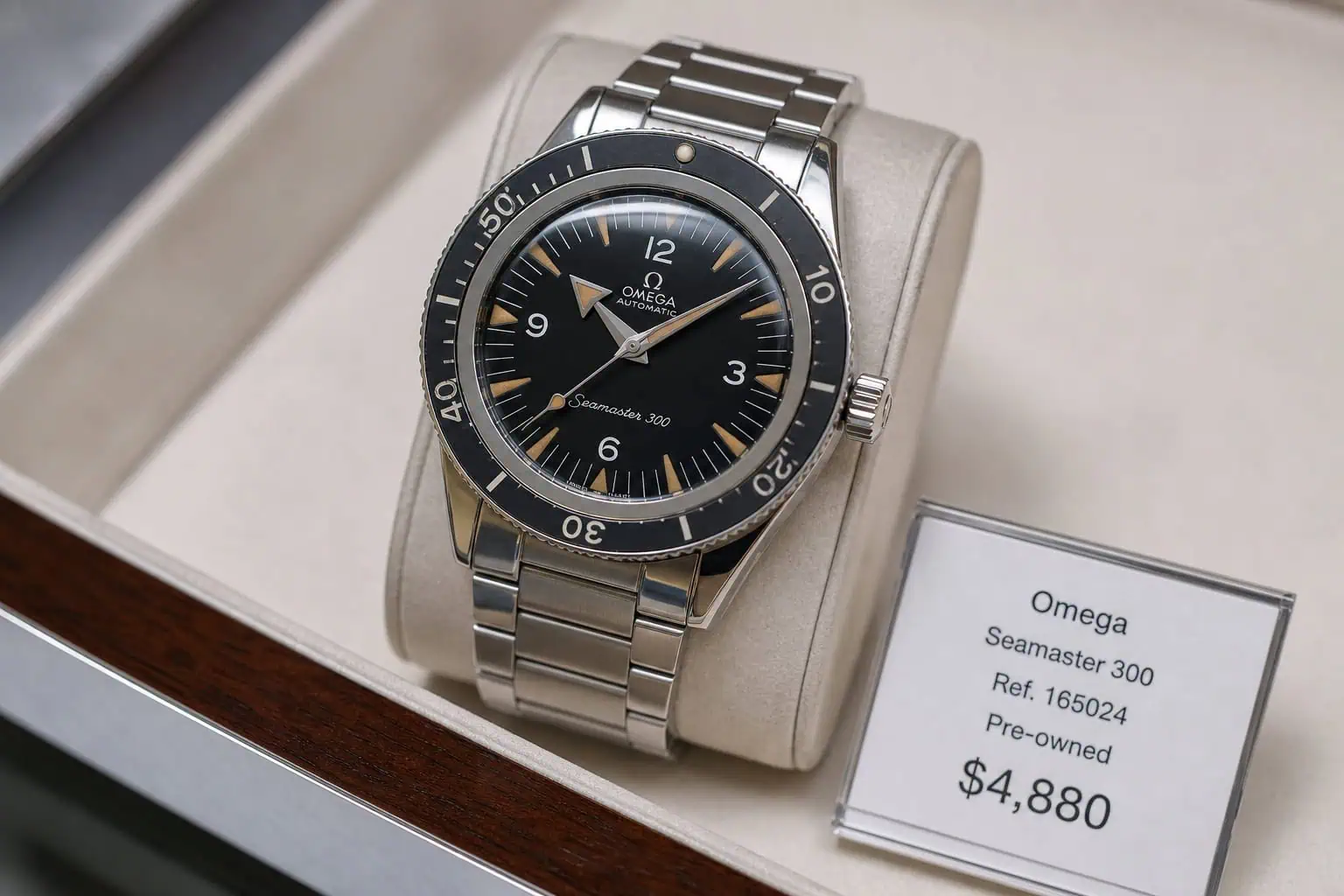 Omega Seamaster 300 pre-owned watch on display with price tag