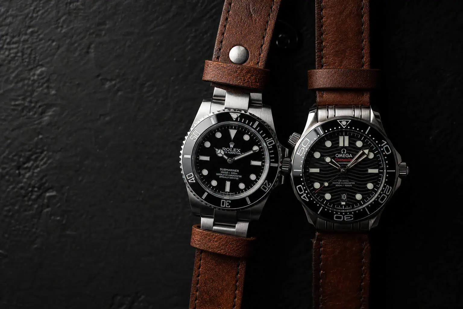 Omega vs Rolex Durability: Which Watch Can Take a Beating? 8 Rolex Submariner and Omega Seamaster side by side for final durability verdict