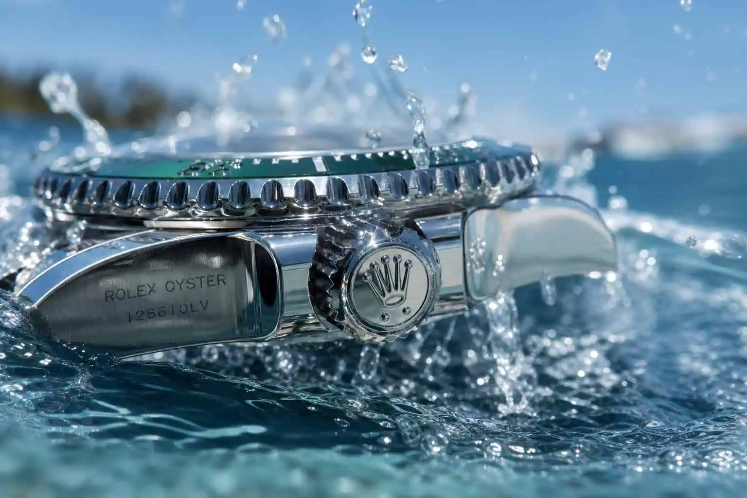 Omega vs Rolex Owners: Age, Income, and What Drives the Choice 3 Rolex Oyster case watch submerged in water with splashing droplets