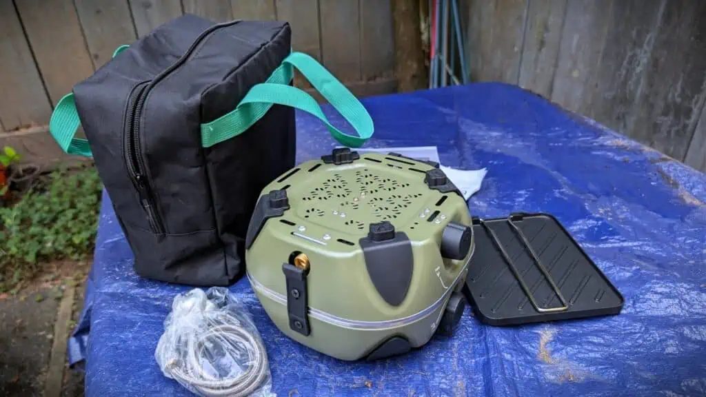 BODEGA 2 Burner Foldable Camping Stove Review 4 Portable BODEGA 2 Burner Foldable Camping Stove with accessories on a blue tarp.