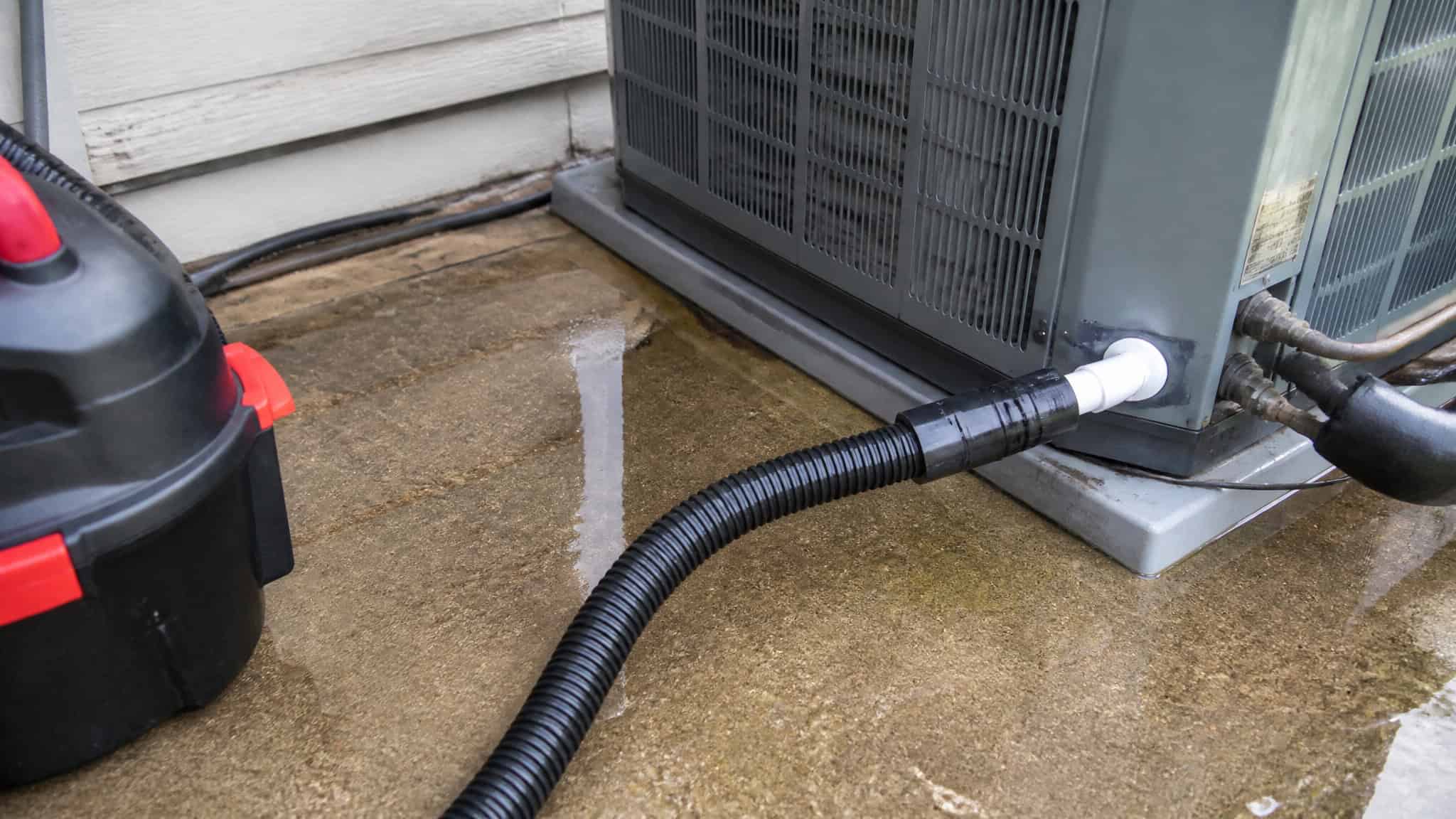 AC Leaking Water? Here's How to Diagnose and Fix It (Step-by-Step Guide) 2 Clearing AC condensate drain line with wet dry vacuum