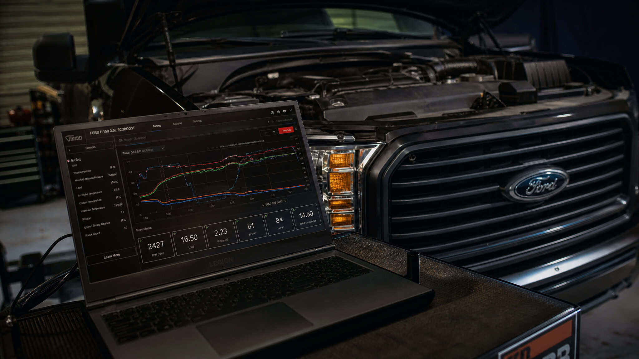 Best F-150 Mods: From Intake to Supercharger, a Tuner's Guide 3 Laptop with custom tuning software connected to a Ford F-150 for performance calibration