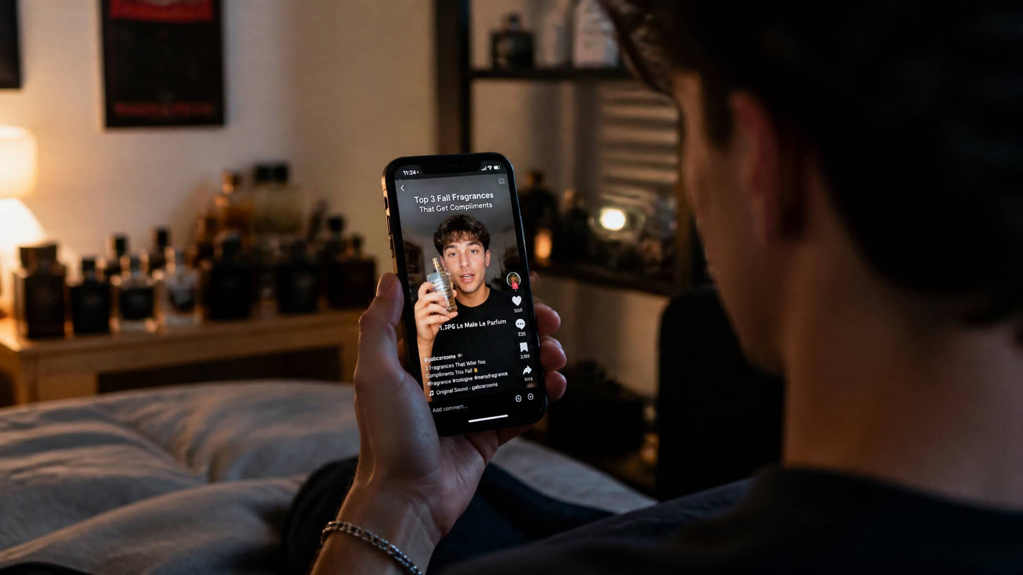 Perfume Obsessed Person: What Defines Them, Really 4 Young man watching a perfume review on TikTok on his smartphone