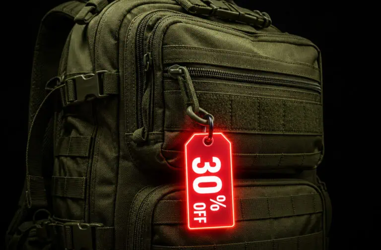 Olive green tactical backpack with a red 30% off discount tag hanging from the zipper, showcasing outdoor and military gear.