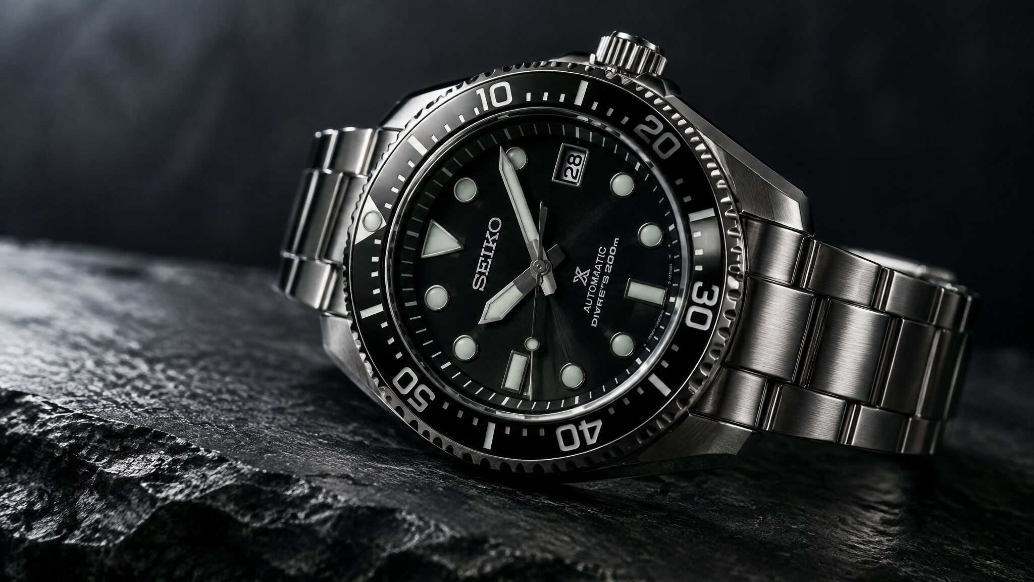 Stainless steel dive watch with rotating bezel, hero image for a men's steel watch buying guide