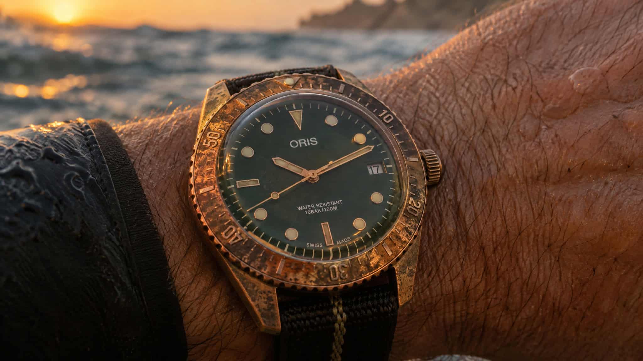 Stainless Steel Watch vs Other Watch Metals: Why Ceramic Wins on Value 4 Bronze dive watch developing uneven patina on the wrist, showing patina is not rust