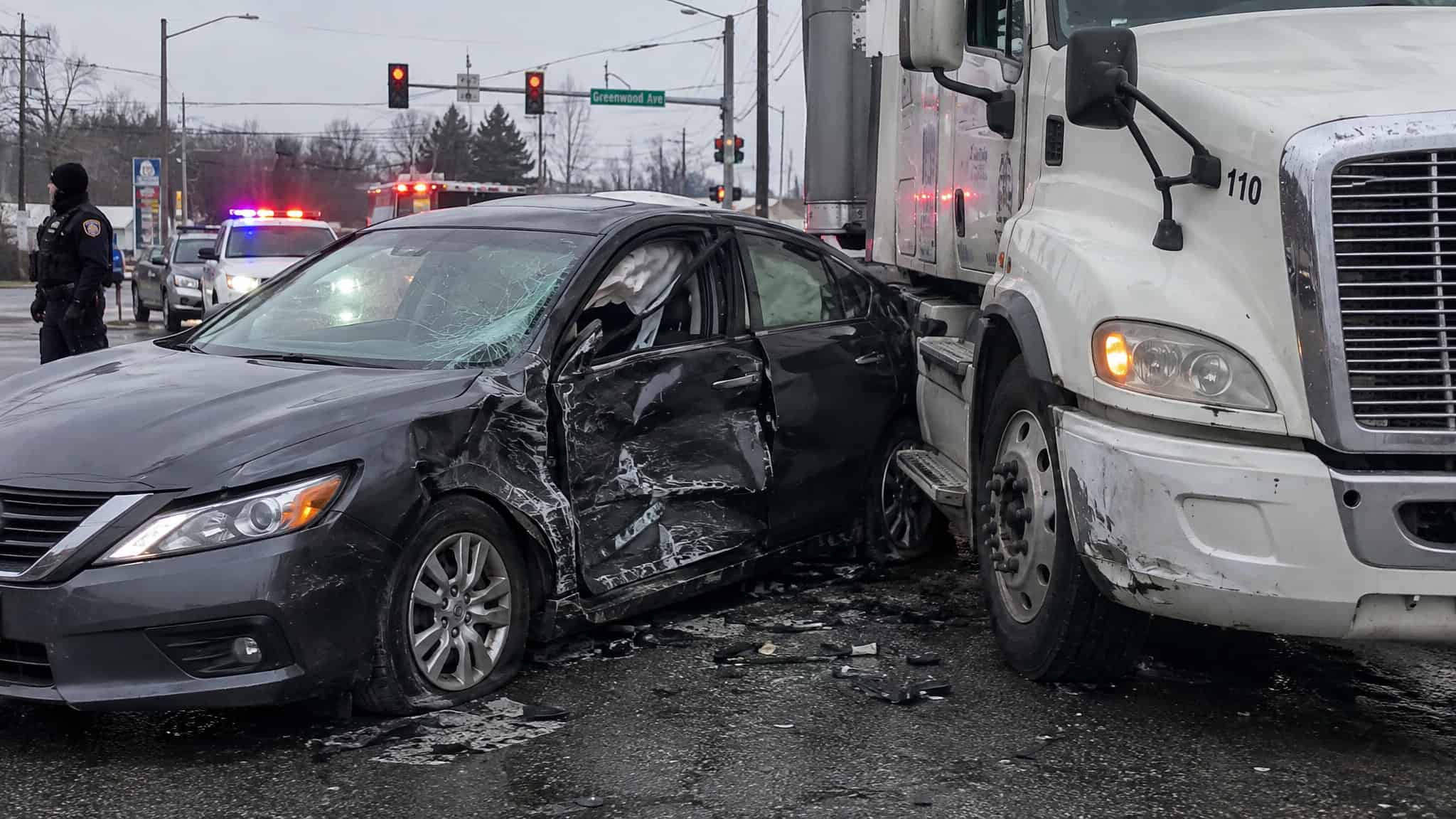 What Kind of Cases Do Personal Injury Lawyers Handle? 9 Case Types, From Car Crashes to Nursing Home Abuse 2 T-bone collision between a car and semi truck illustrating motor vehicle accident injury claims