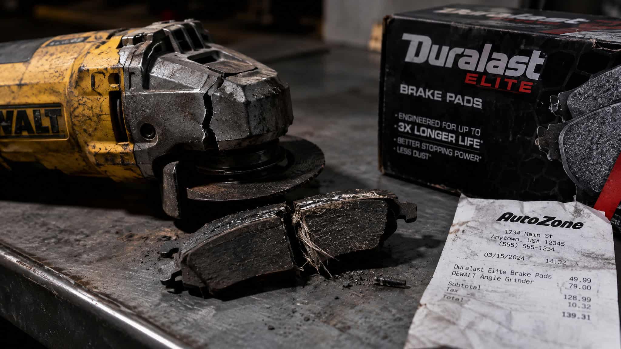 What Kind of Cases Do Personal Injury Lawyers Handle? 9 Case Types, From Car Crashes to Nursing Home Abuse 3 Close-up of worn brake pads and a power tool on a workbench, with Duralast Elite brake pads box in the background, highlighting automotive maintenance.