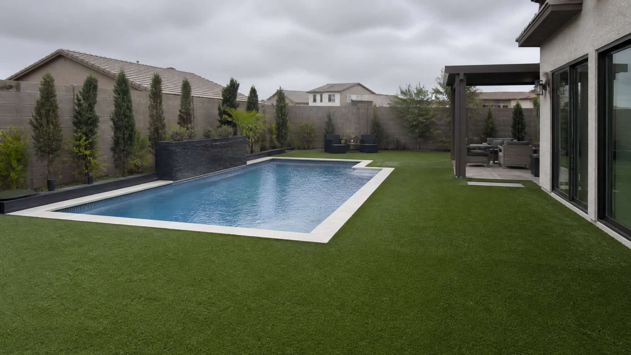 Top 10 Things That Add Value to Your Home: 2025 ROI Data 5 Pool and artificial turf backyard upgrades with weak resale ROI