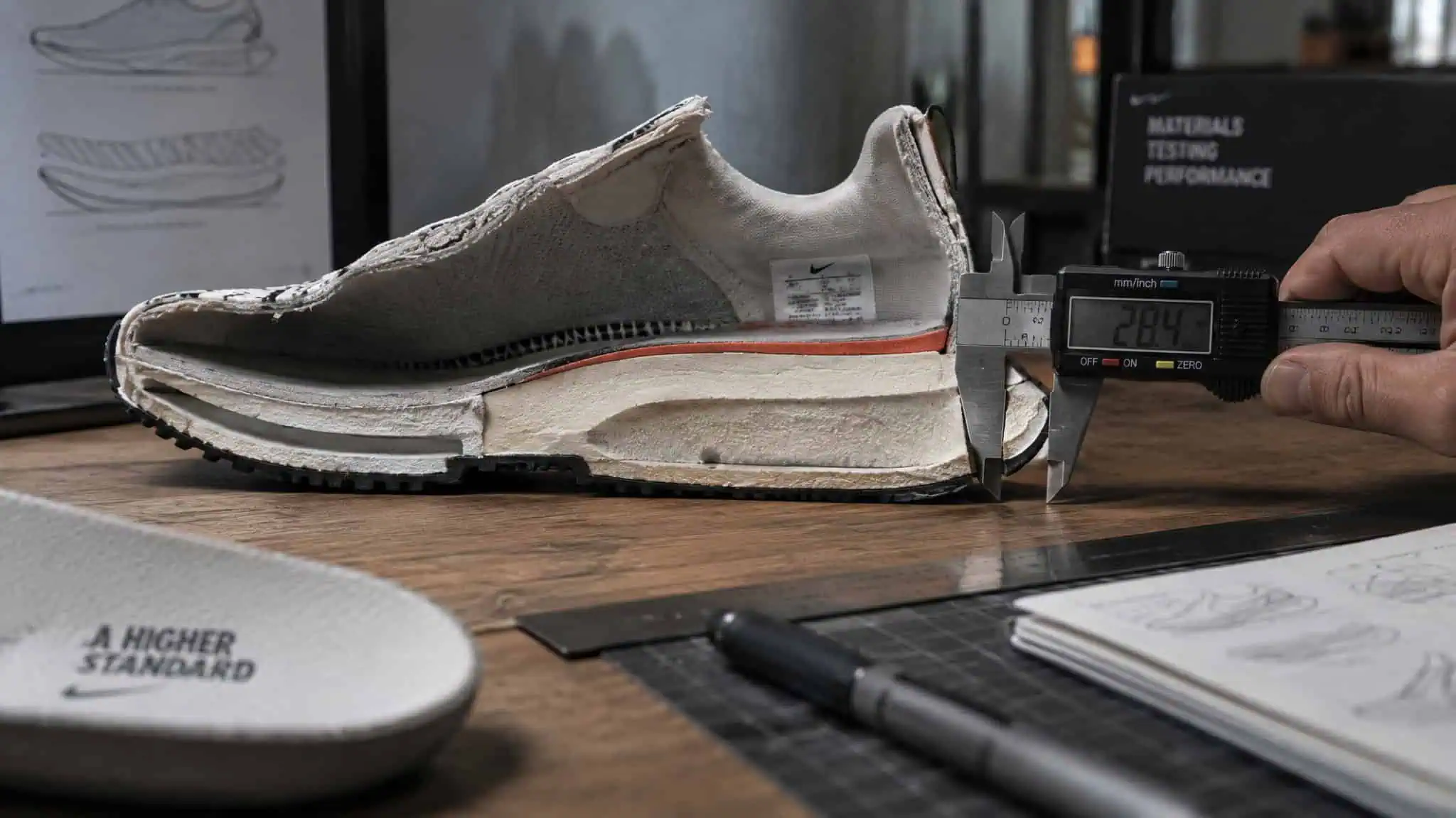 Shoes That Make You 2 Inches Taller: Lab-Measured Heel Stacks, Not Marketing Math 2 Calipers measuring sneaker heel stack to test the honest two-inch height math