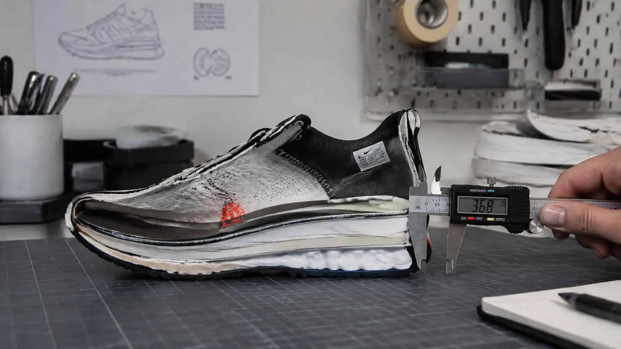 Height Increasing Shoes 4 Inches: What a 4-Inch Lift Really Delivers 2 Sneaker heel stack measured with calipers showing real height gain under two inches