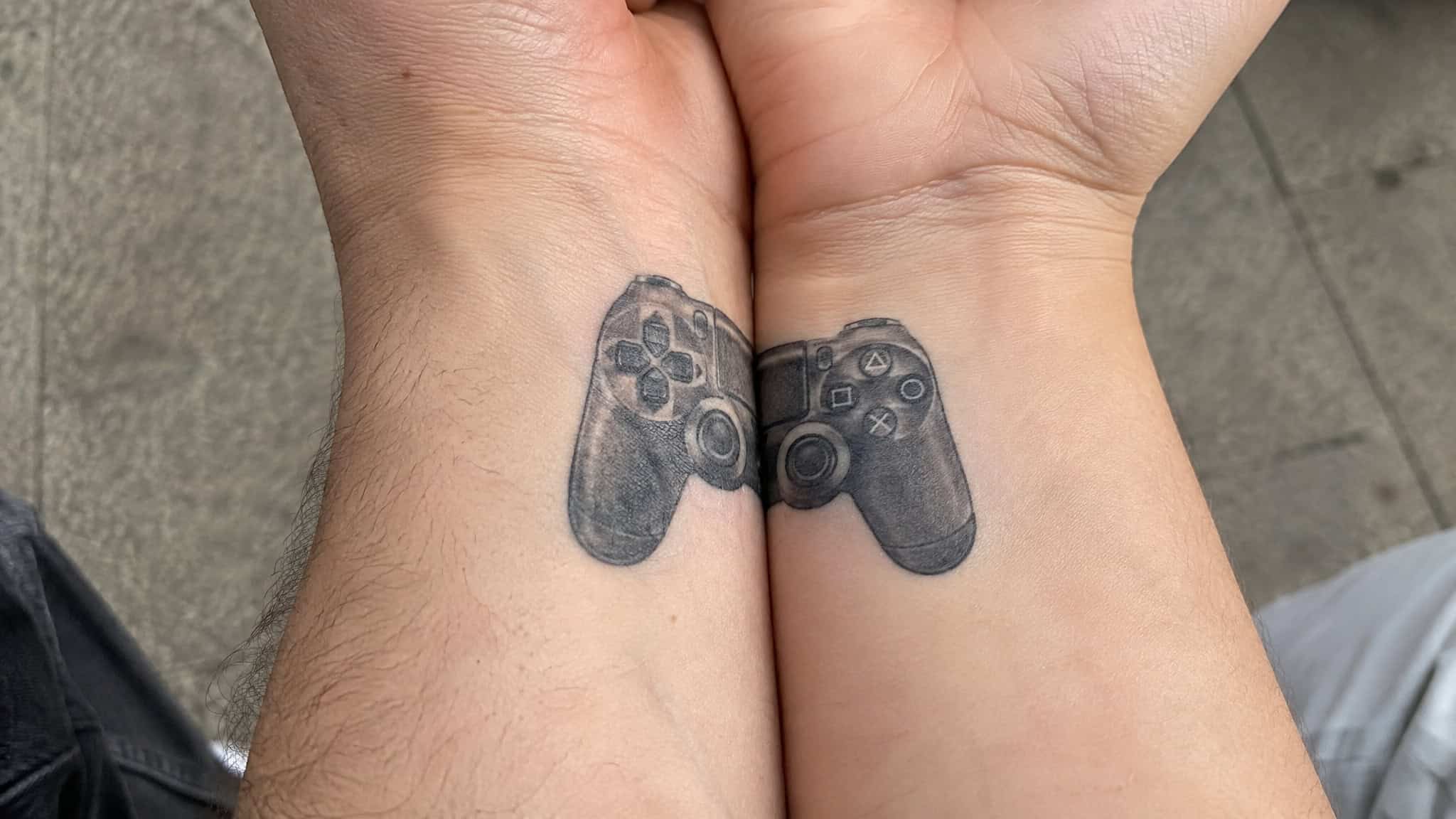 Testing split controller tattoo placement symmetry with temporary tattoos before permanent ink