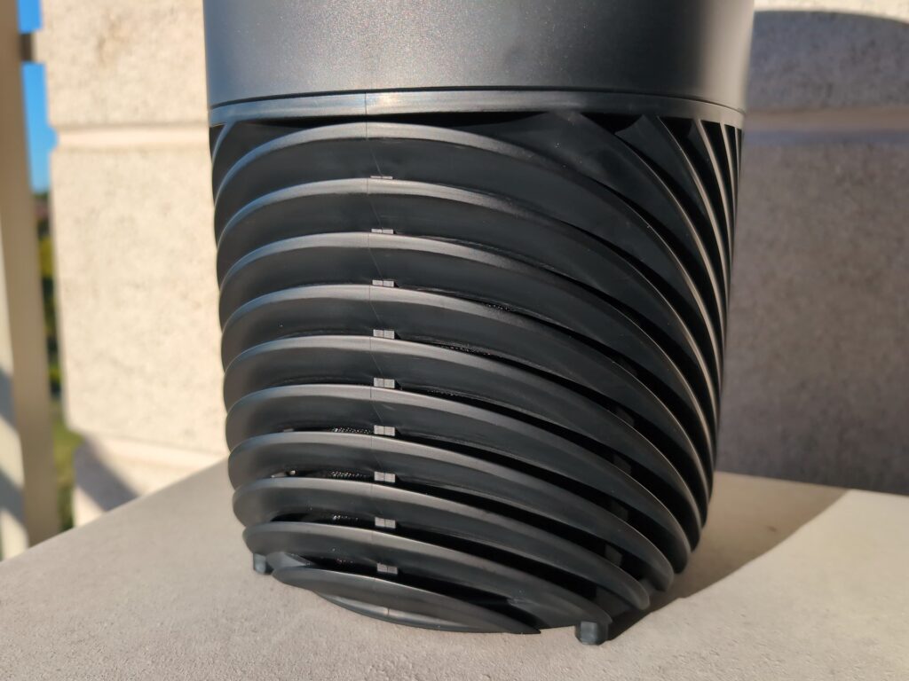 PuroAir 130i HEPA Smart Air Purifier Review: Why Its Real Room Size Is 116 Sq Ft, Not 600 3 Close-up of the PuroAir 130i HEPA Smart Air Purifier showing its black, spiral design and air intake vents.